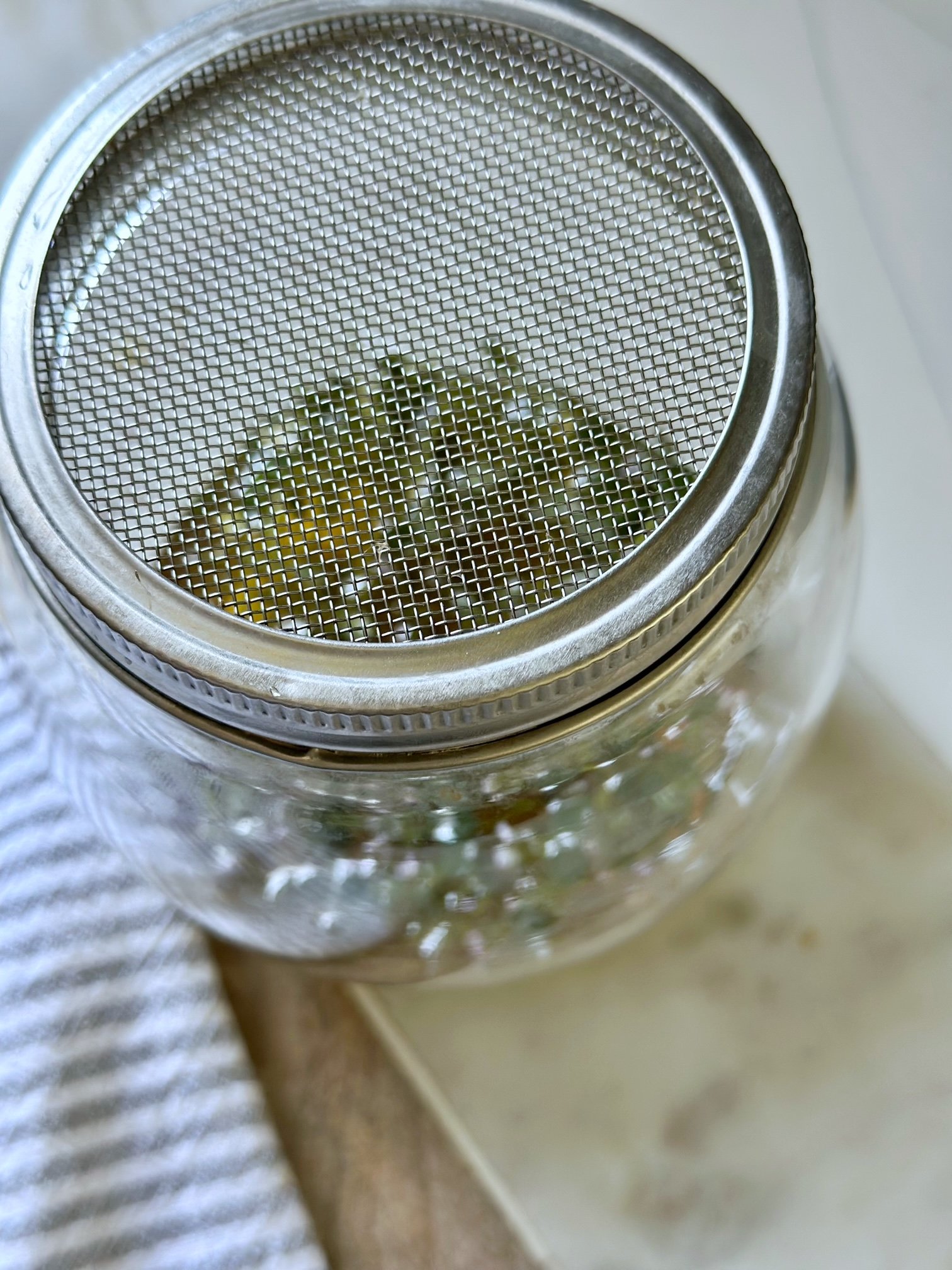Mesh strainer over the jar.